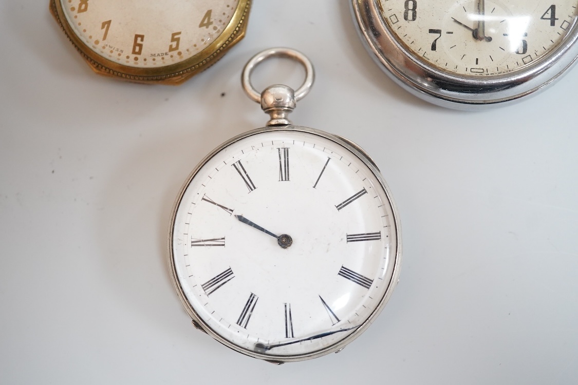 A late 1930's base metal cased Air Ministry spilt second stop watch, case diameter 60mm, together with a Swiss 935 standard open faced pocket watch, one other small white metal pocket watch and three base metal pocket wa
